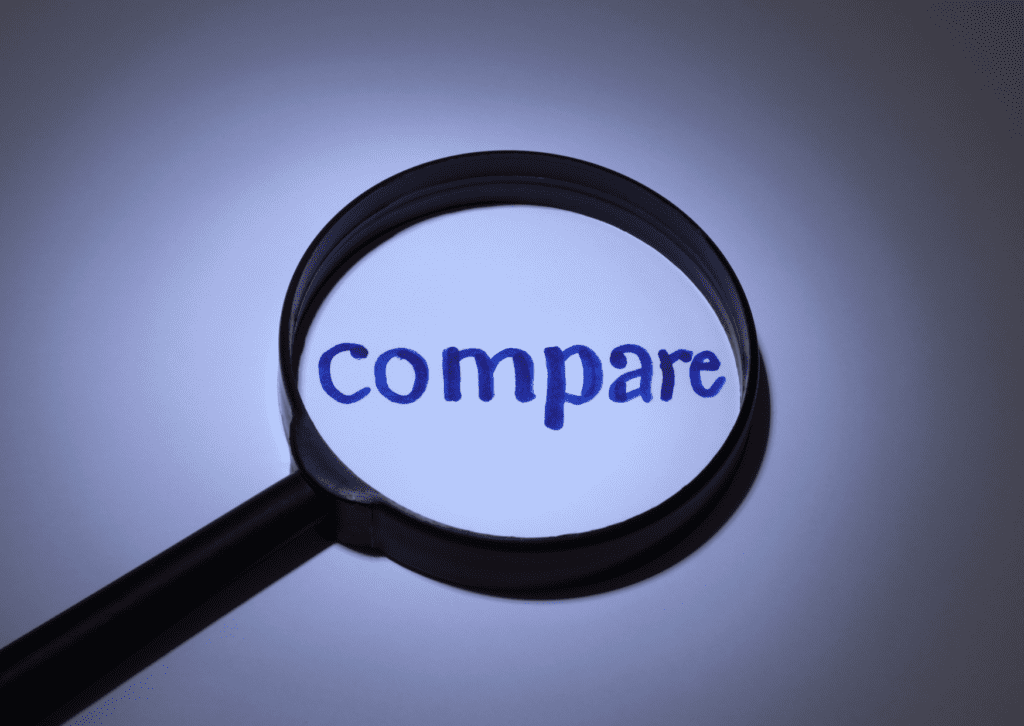 Magnifying glass highlighting the word "compare." Perfect for comparing estimates.