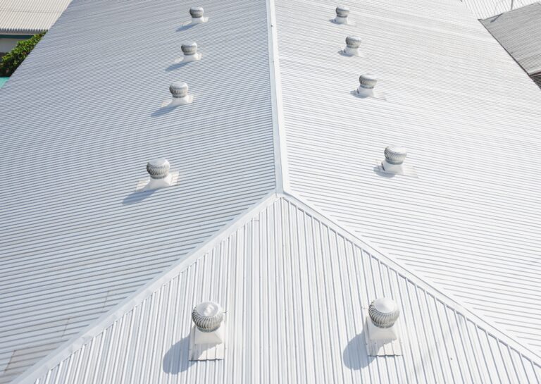 Metal roofs showcase proper ventilation, highlighting the importance of preventative maintenance for commercial roofs.